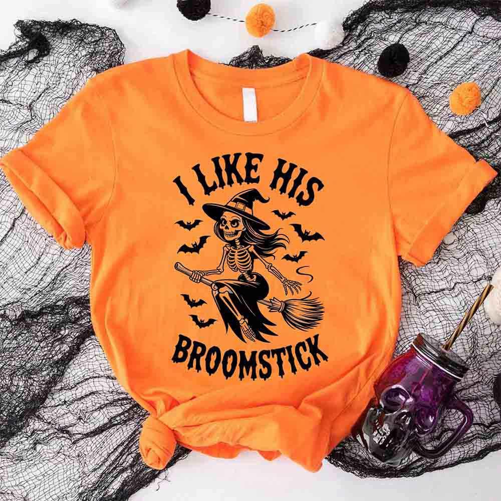 Orange Halloween T-shirt with 'I Like His Broomstick' skeleton witch graphic