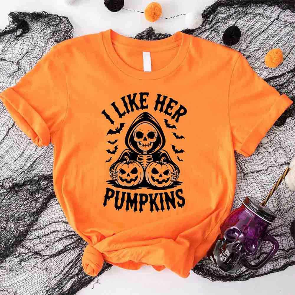 Orange Halloween T-shirt with 'I Like Her Pumpkins' skull and pumpkin print