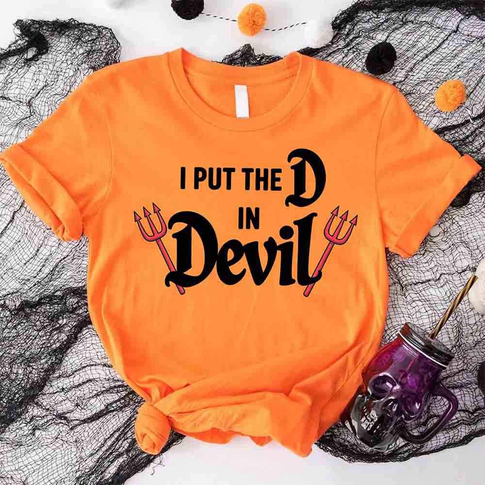 Orange Halloween T-shirt with “I Put the D in Devil” devil pitchfork graphic