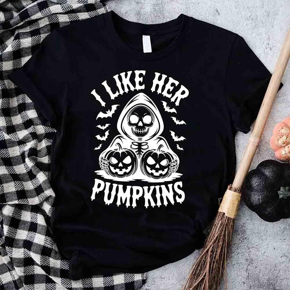Black Halloween couple T-shirt with “I LIKE HER PUMPKINS” skull and pumpkin graphic