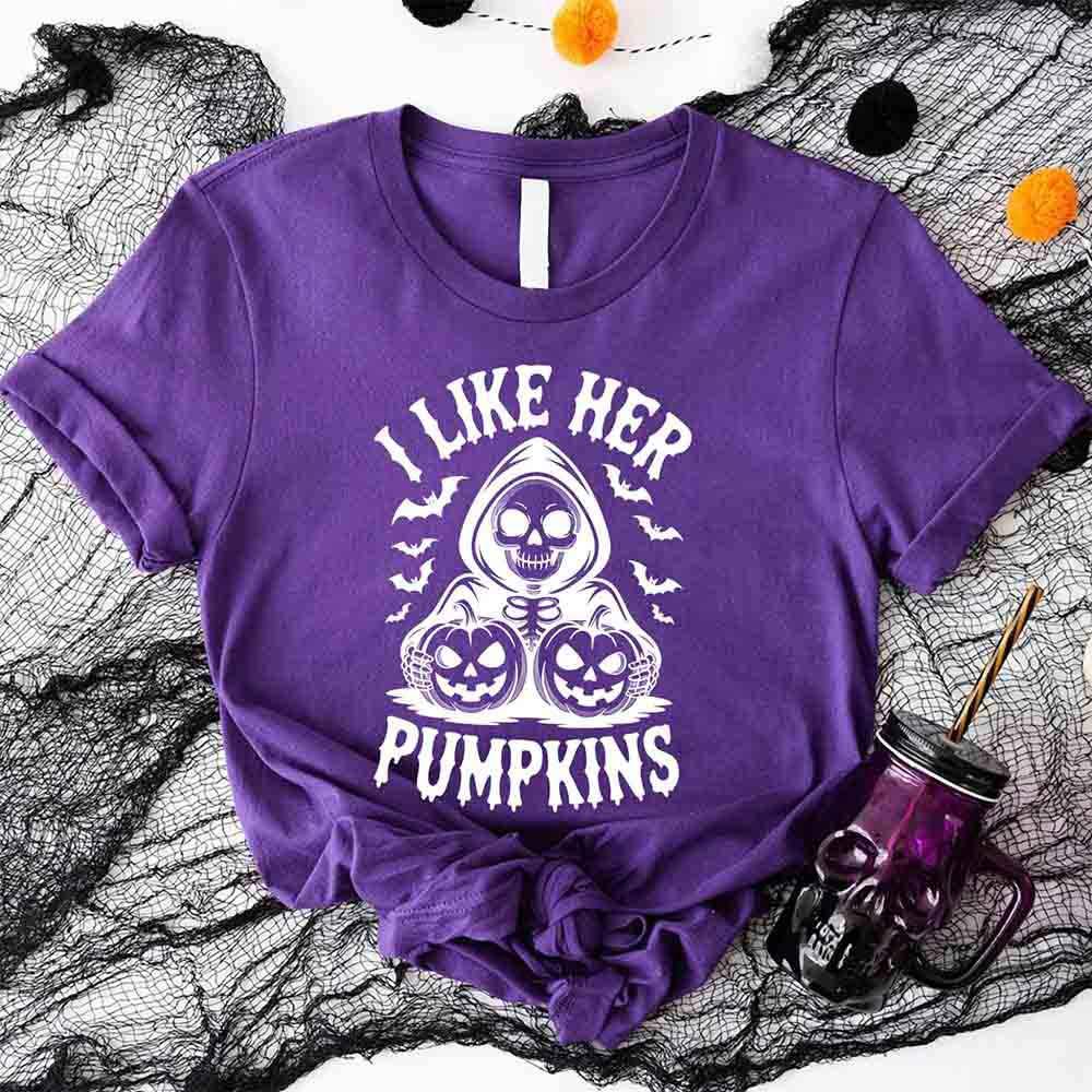 Purple Halloween T-shirt with 'I Like Her Pumpkins' skull and pumpkin graphic