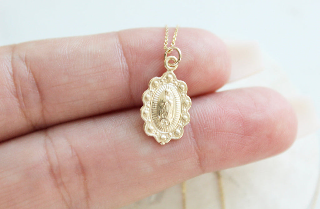 14k gold Our Lady of Guadalupe scalloped pendant with loop top on chain
