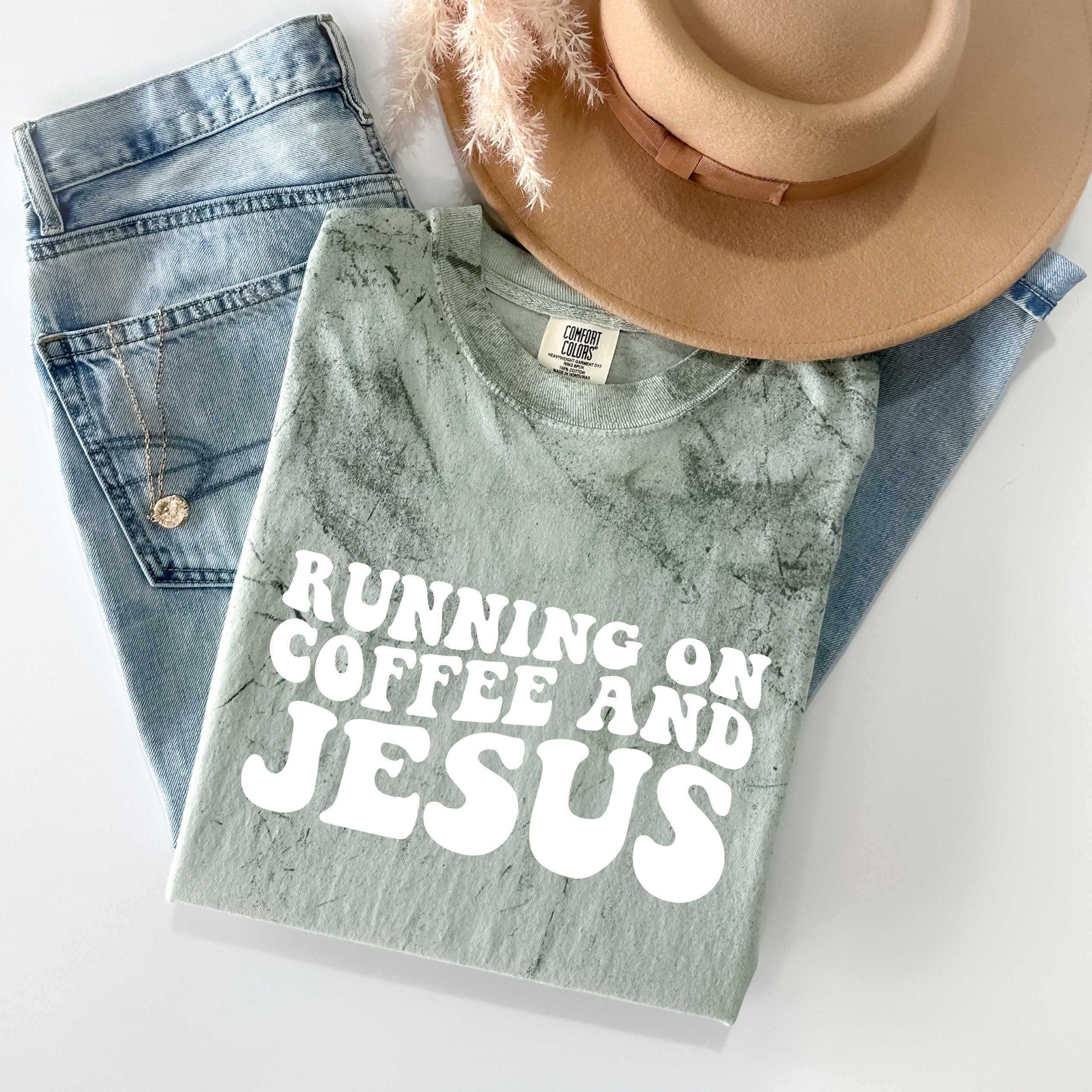 Heather green Christian T-shirt with “RUNNING ON COFFEE AND JESUS” screen print