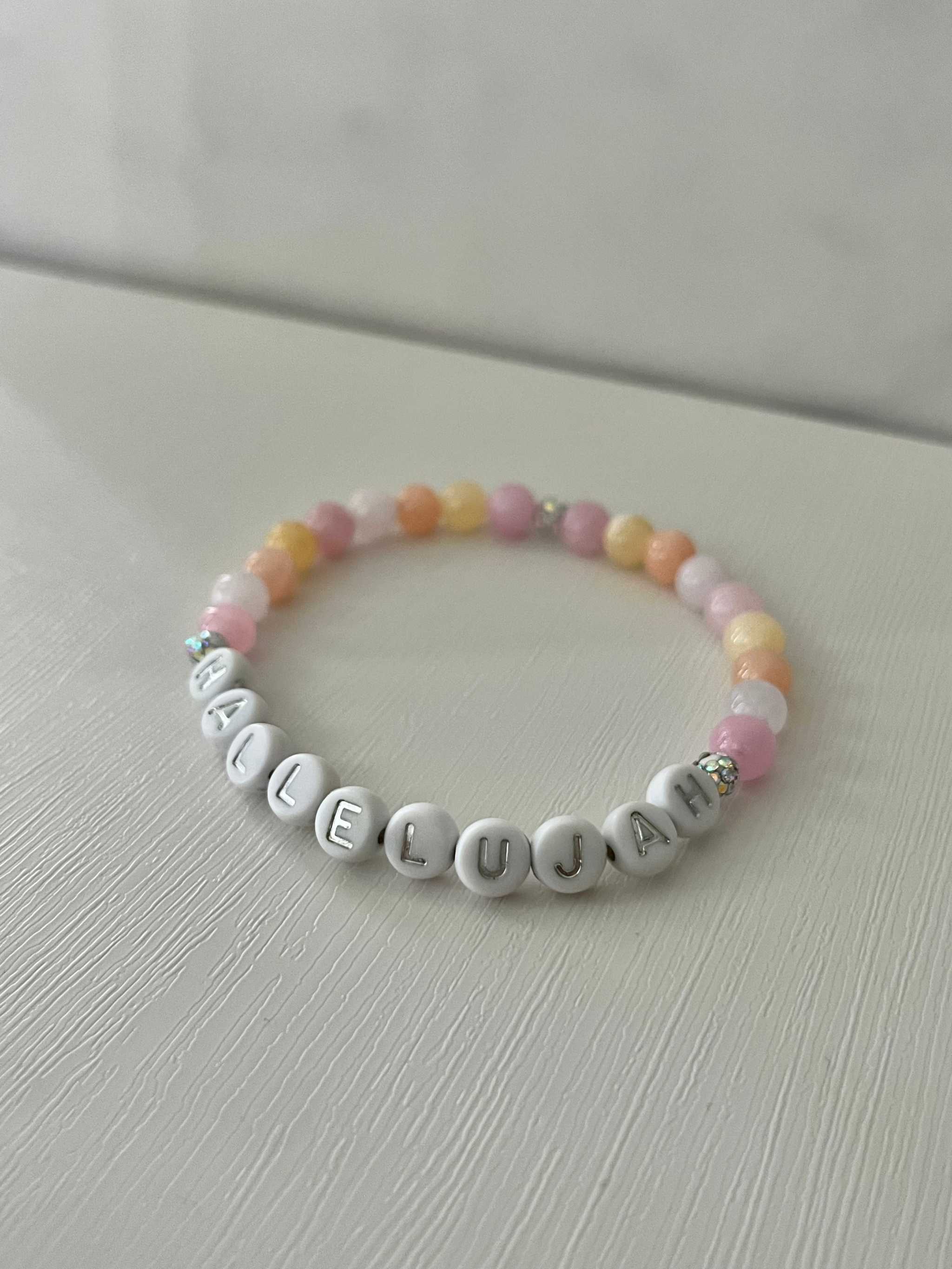 Letter bead bracelet with pastel beads and silver beads spelling HALLELUJAH