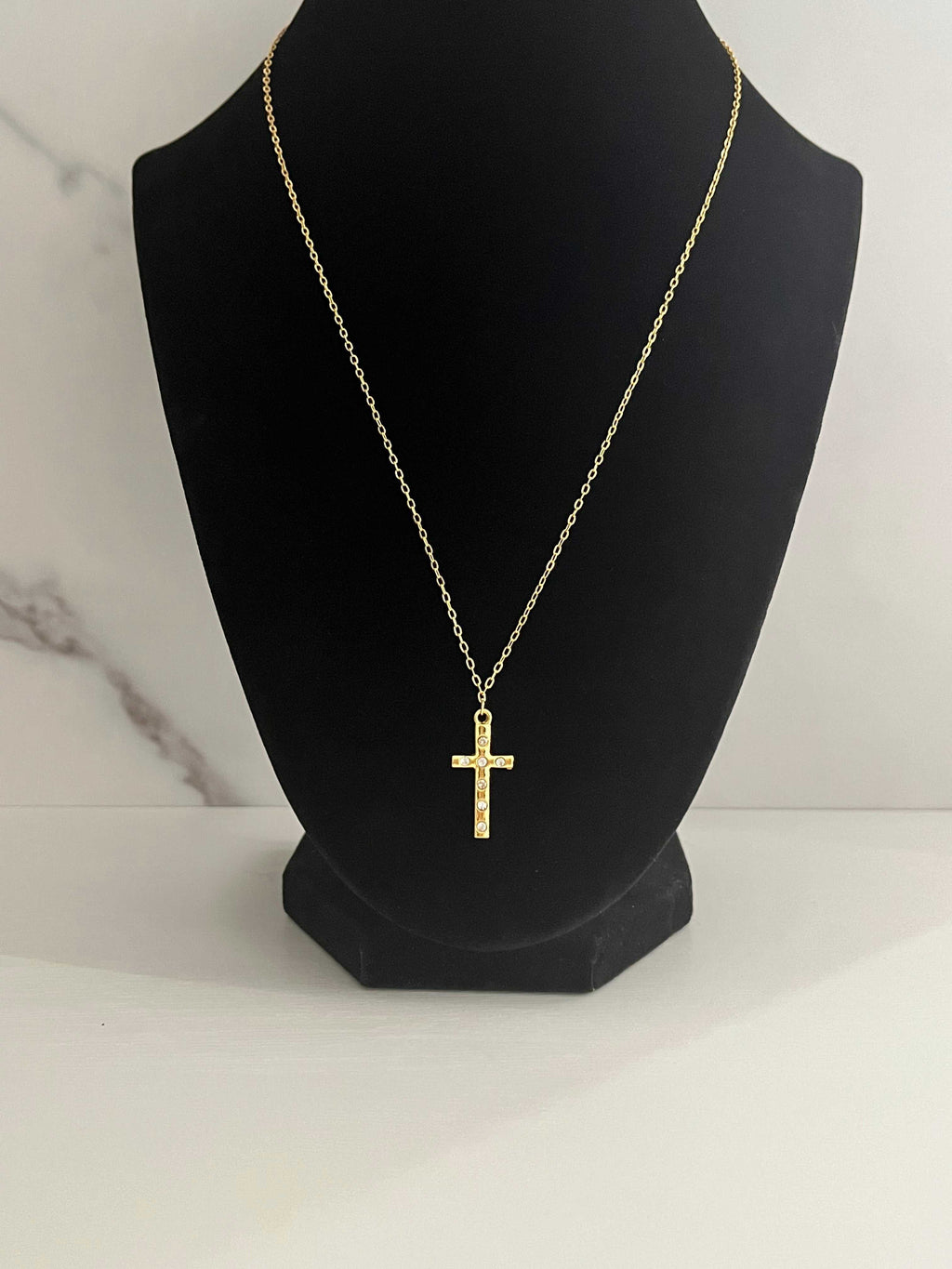Gold cross pendant necklace, cross charm centered with thin link chain
