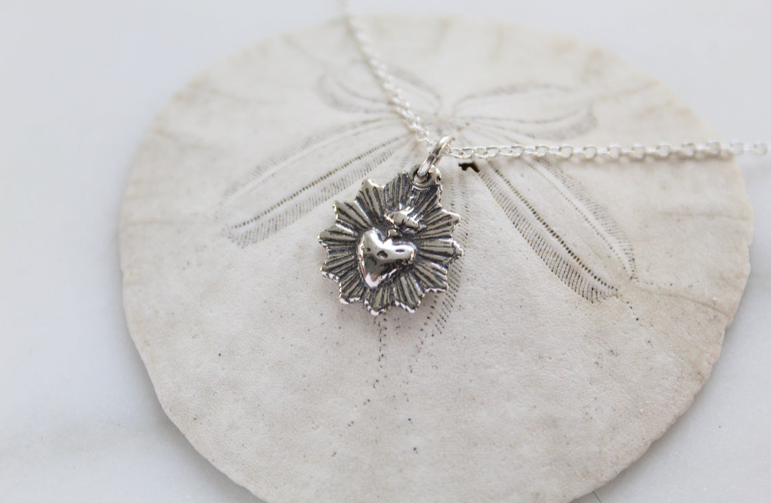Oxidized silver heart pendant necklace with scalloped sacred heart charm
