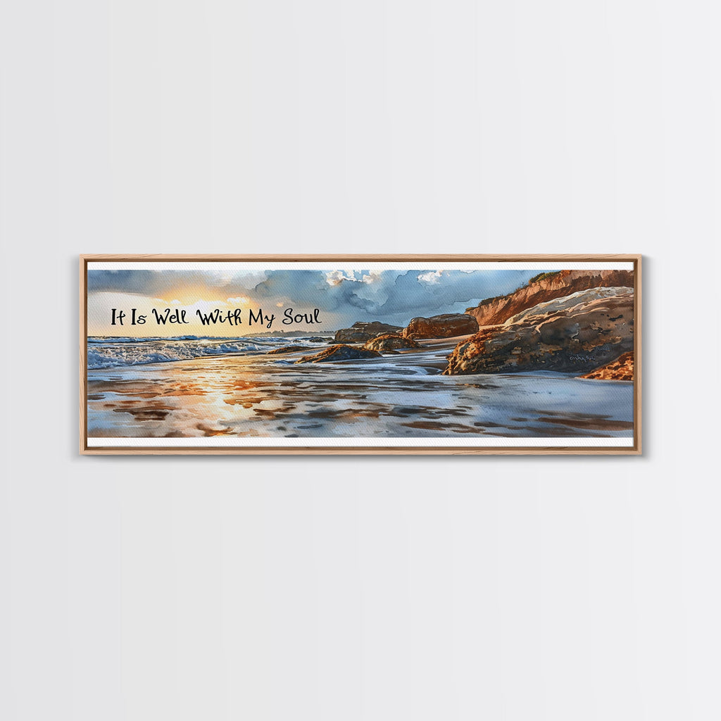 Coastal beach wall art canvas in light wood frame with scripture text and rocky shoreline