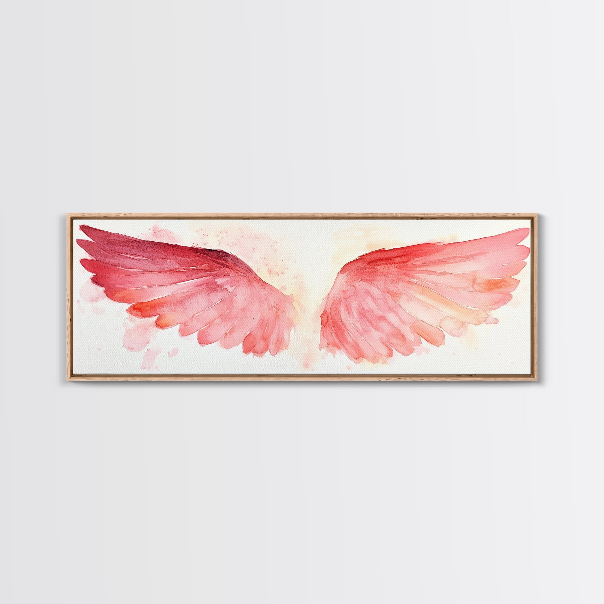 Angel wings canvas print in light wood frame with pink watercolor wings