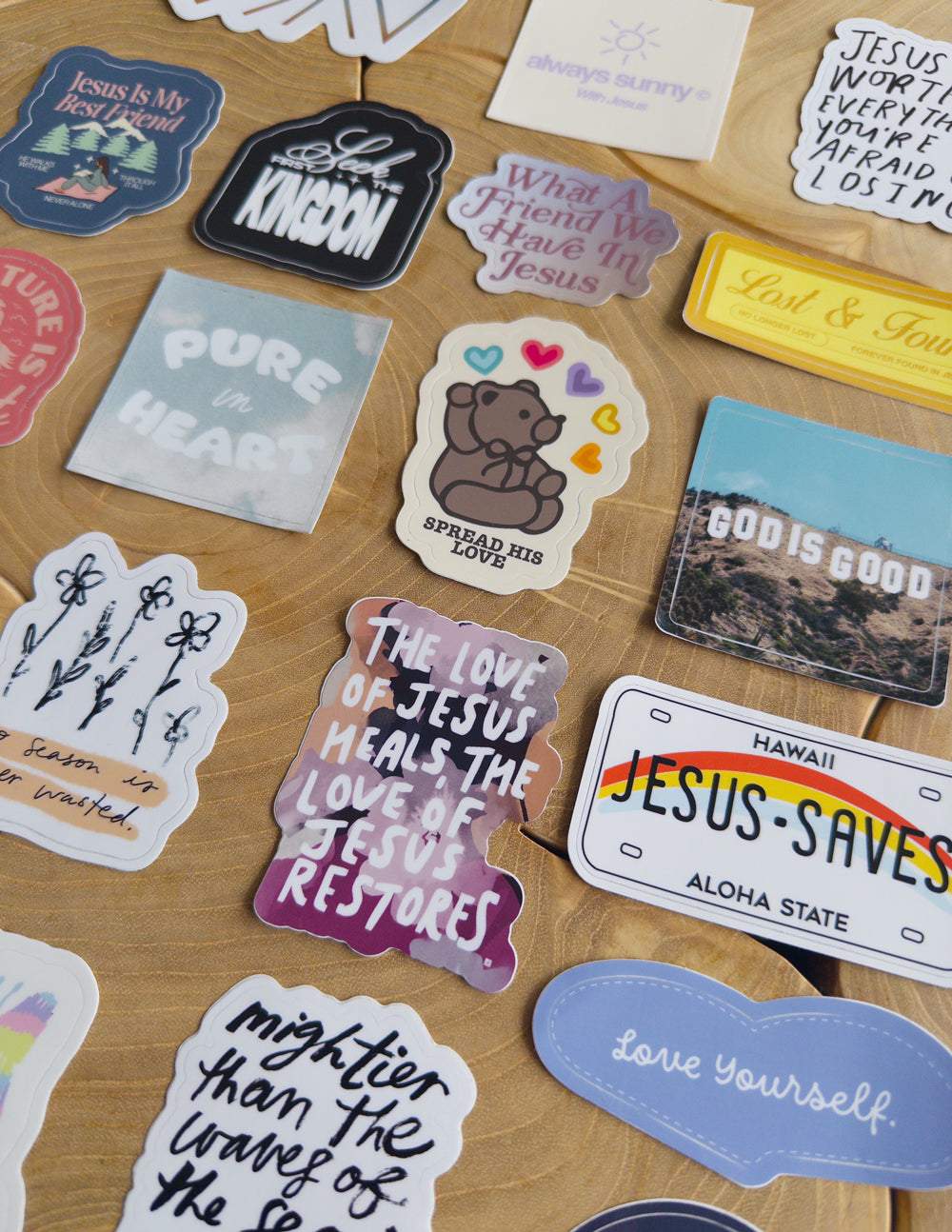 Religious stickers with assorted sayings and Jesus designs in multiple colors