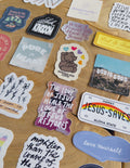Religious stickers with assorted sayings and Jesus designs in multiple colors