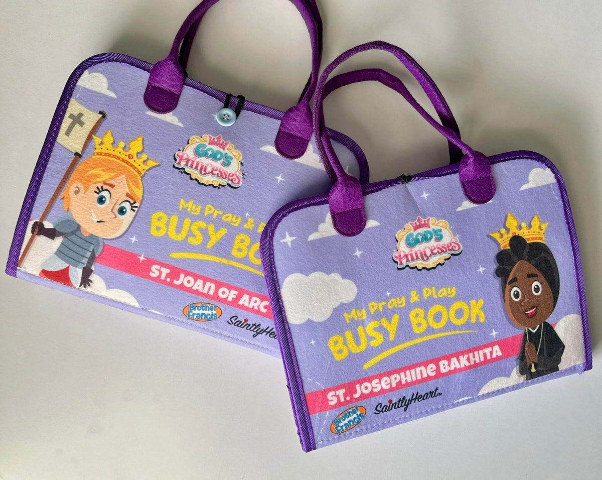 Open kids busy book with purple binding and carry handles, saint princess cover art