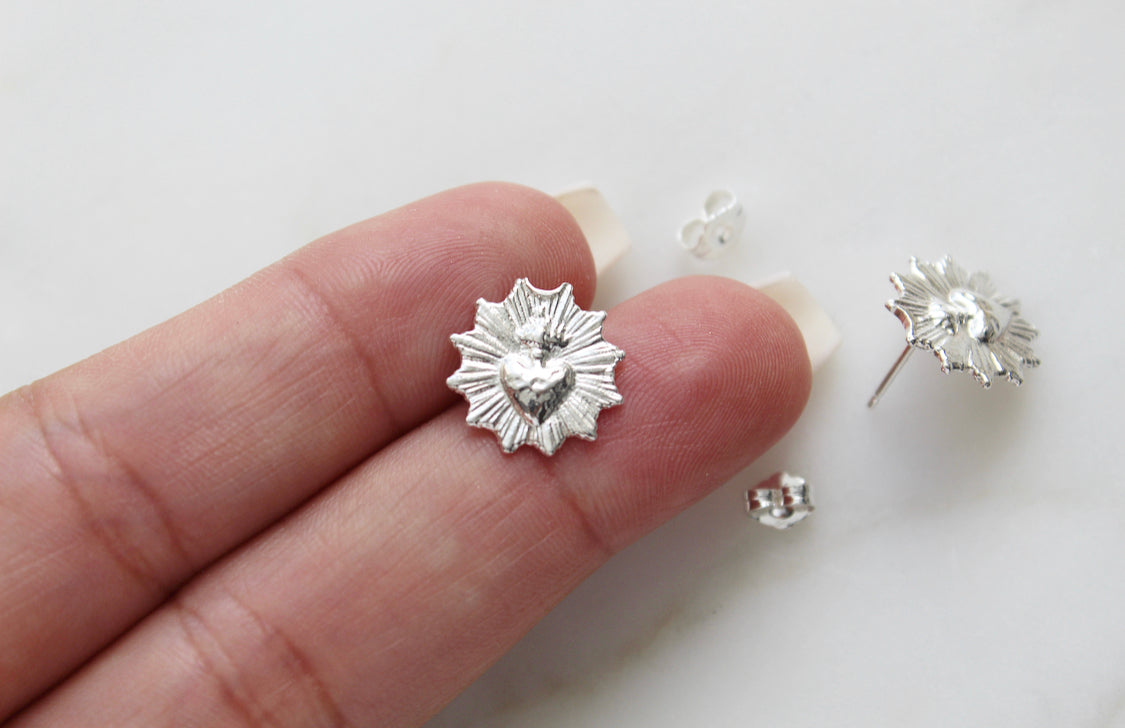 Sacred heart stud earrings, silver-tone starburst heart motif