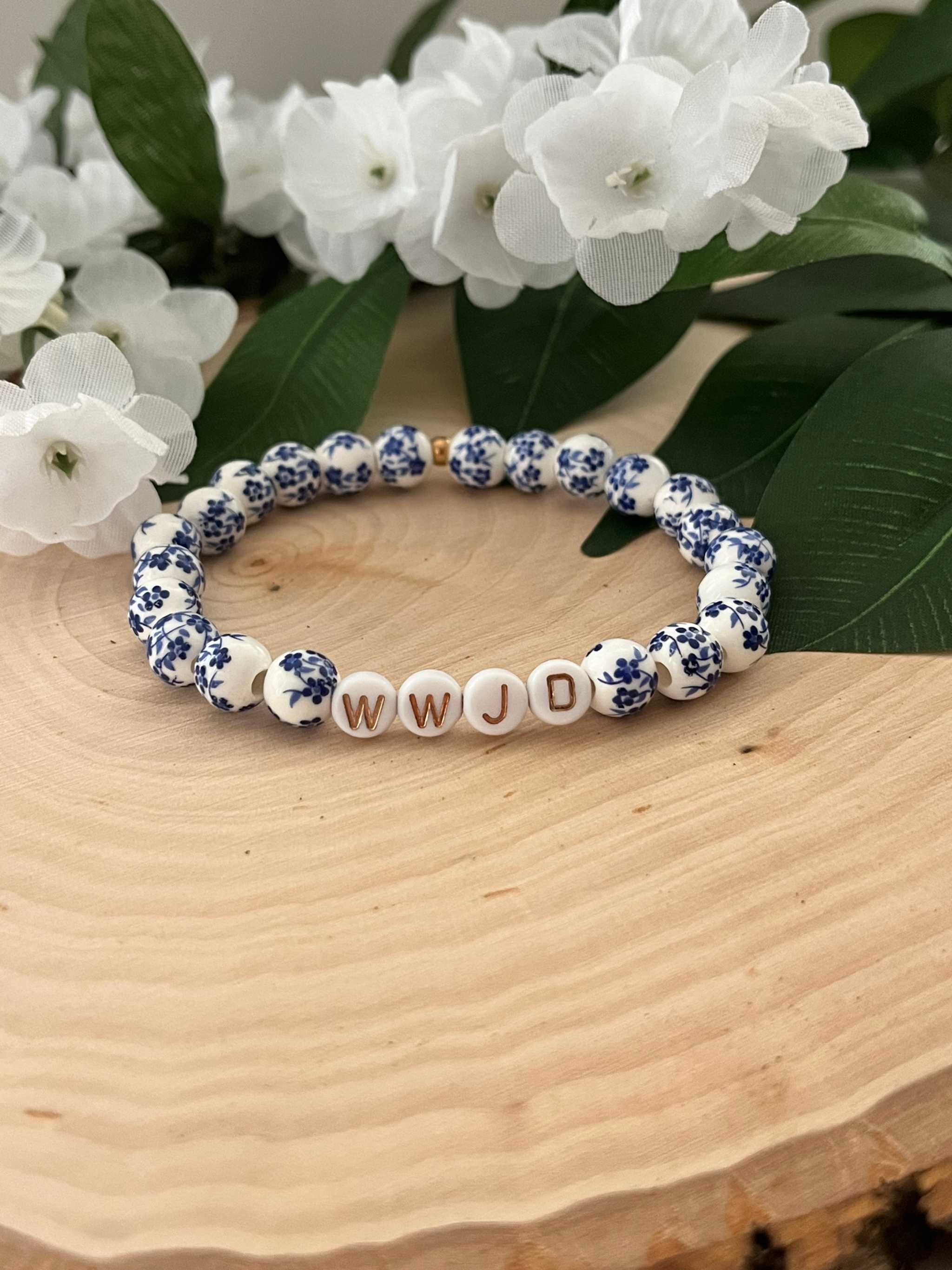 Blue and white patterned bead bracelet with WWJD letter beads
