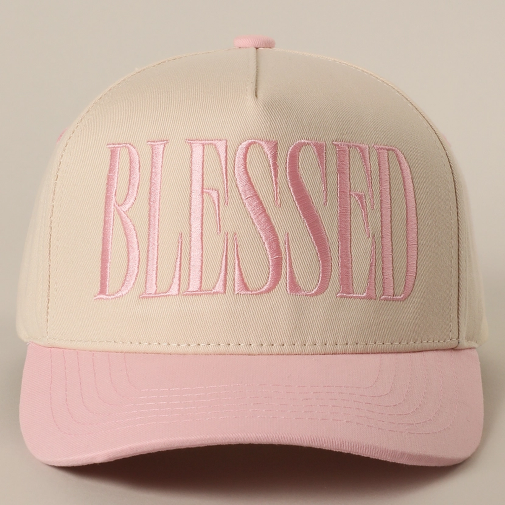 Light pink baseball cap with embroidered BLESSED logo and pink curved brim