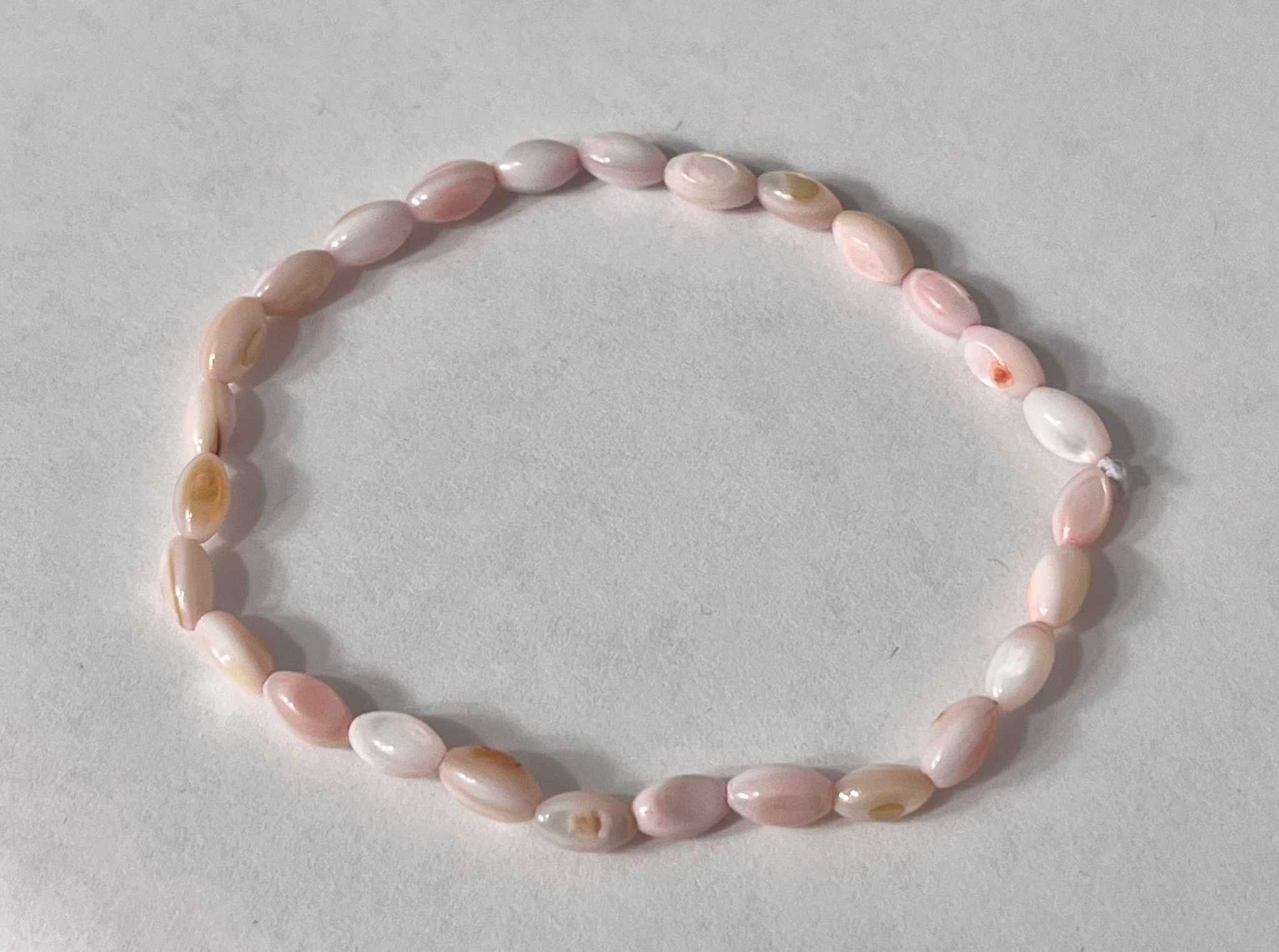 Freshwater pearl bead bracelet with pale pink and white oval pearl beads