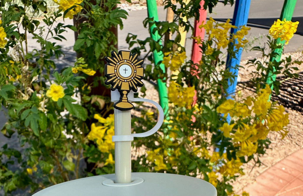 Gold Adoration straw topper on white straw, sunburst cross and chalice charm