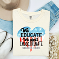 Ivory teacher T-shirt with 'We Educate' graphic and 'We don't indoctrinate' text