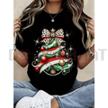 Women’s black T-shirt with glitter Christmas tree graphic, leopard bow and red ornaments