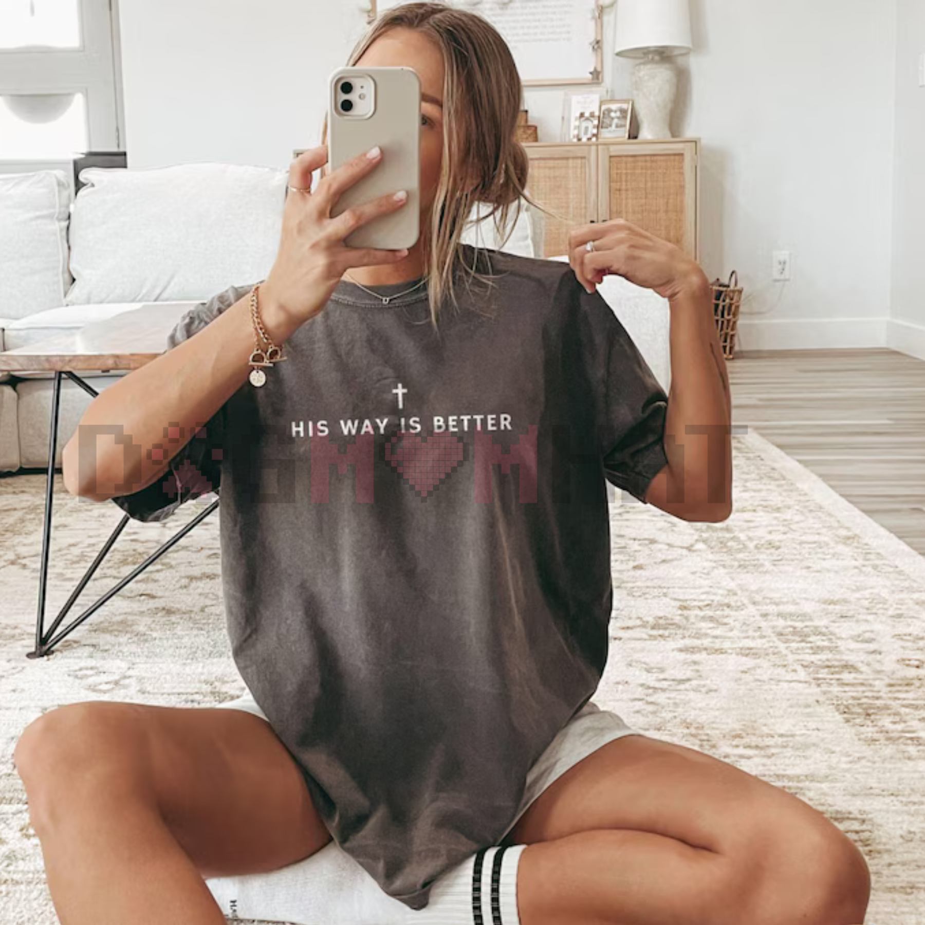 Charcoal crewneck T-shirt with short sleeves and centered text with cross graphic