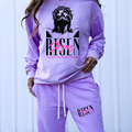 Neon violet crewneck sweatshirt with Jesus graphic and pink text, long sleeves