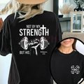 Black Christian graphic t-shirt with bold strength scripture print