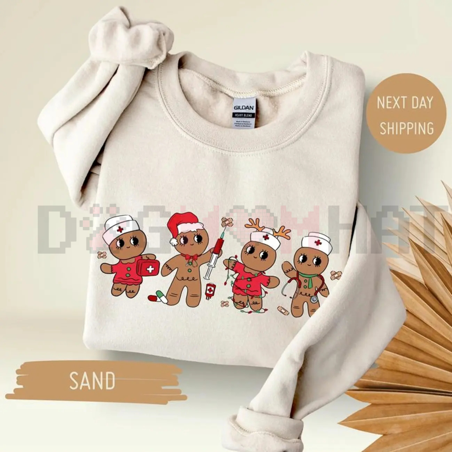 Sand sweatshirt with cartoon gingerbread nurse characters graphic on front, crew neck