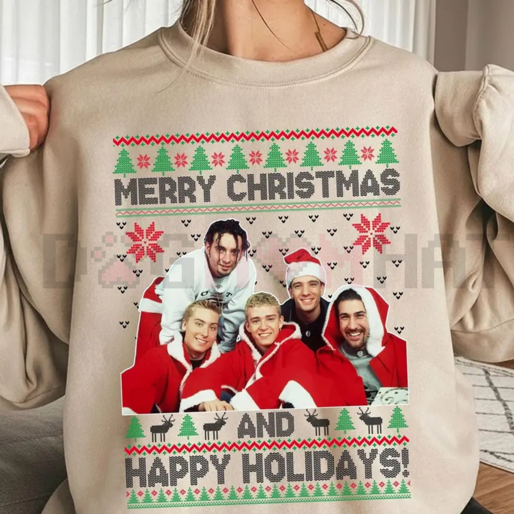 Beige crewneck sweatshirt with 'Merry Christmas' and 'Happy Holidays' front graphic
