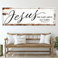 Framed Jesus wall art with 'The name above all names' and 'Philippians 2:9'