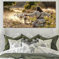 Landscape canvas wall art: kneeling figure guiding a flock of sheep in a field