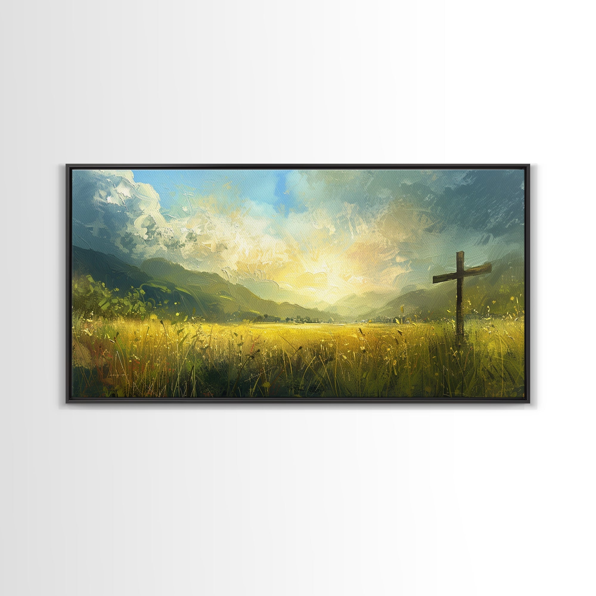 Framed canvas print showing a cross in a grassy field with distant mountains