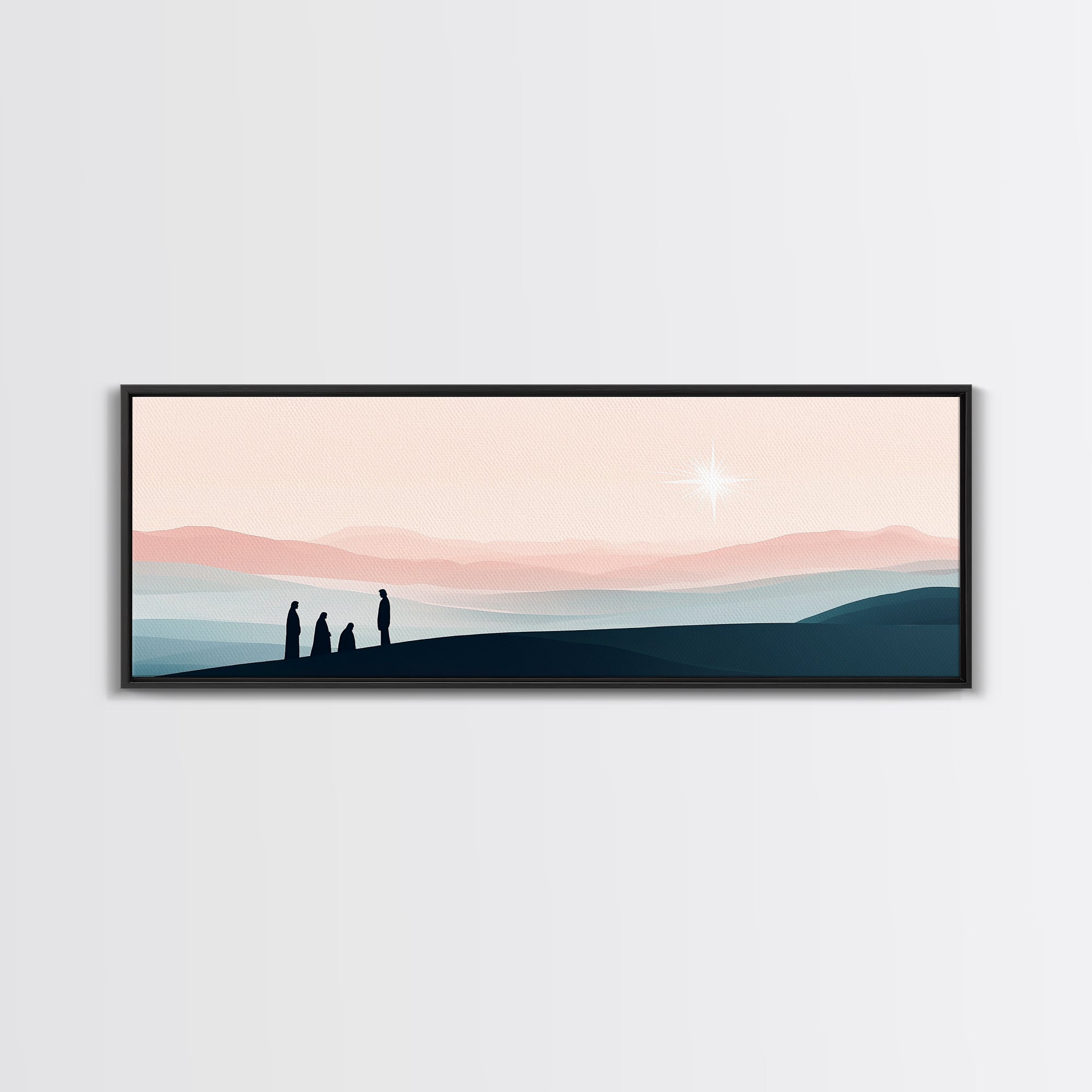 Black framed landscape canvas print with silhouetted figures at the horizon and glowing star