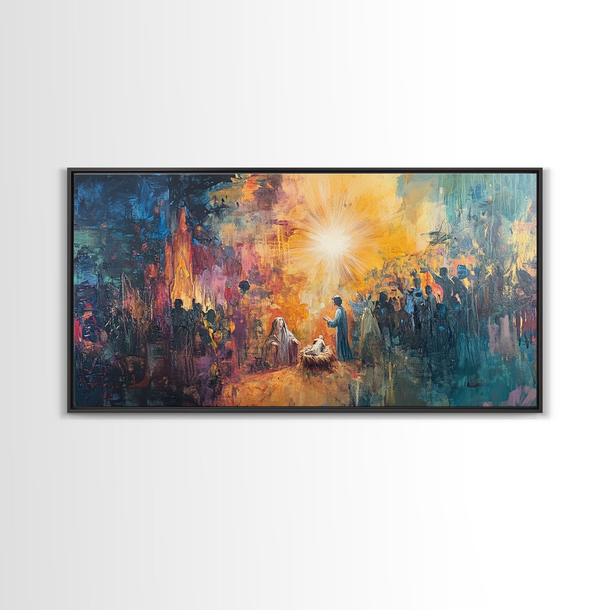 Nativity canvas print in black frame with radiant star glow and nativity figures in town