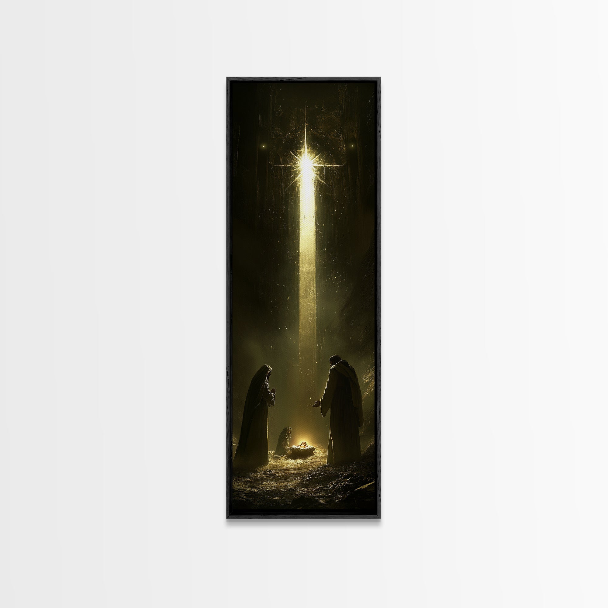 Nativity painting print in a black frame with tall beam of light and two figures