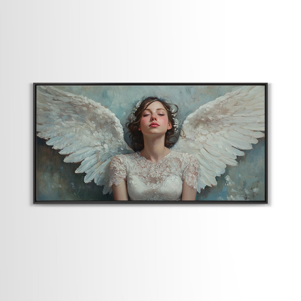 Framed angel canvas print with white wings and pale blue background, charcoal frame