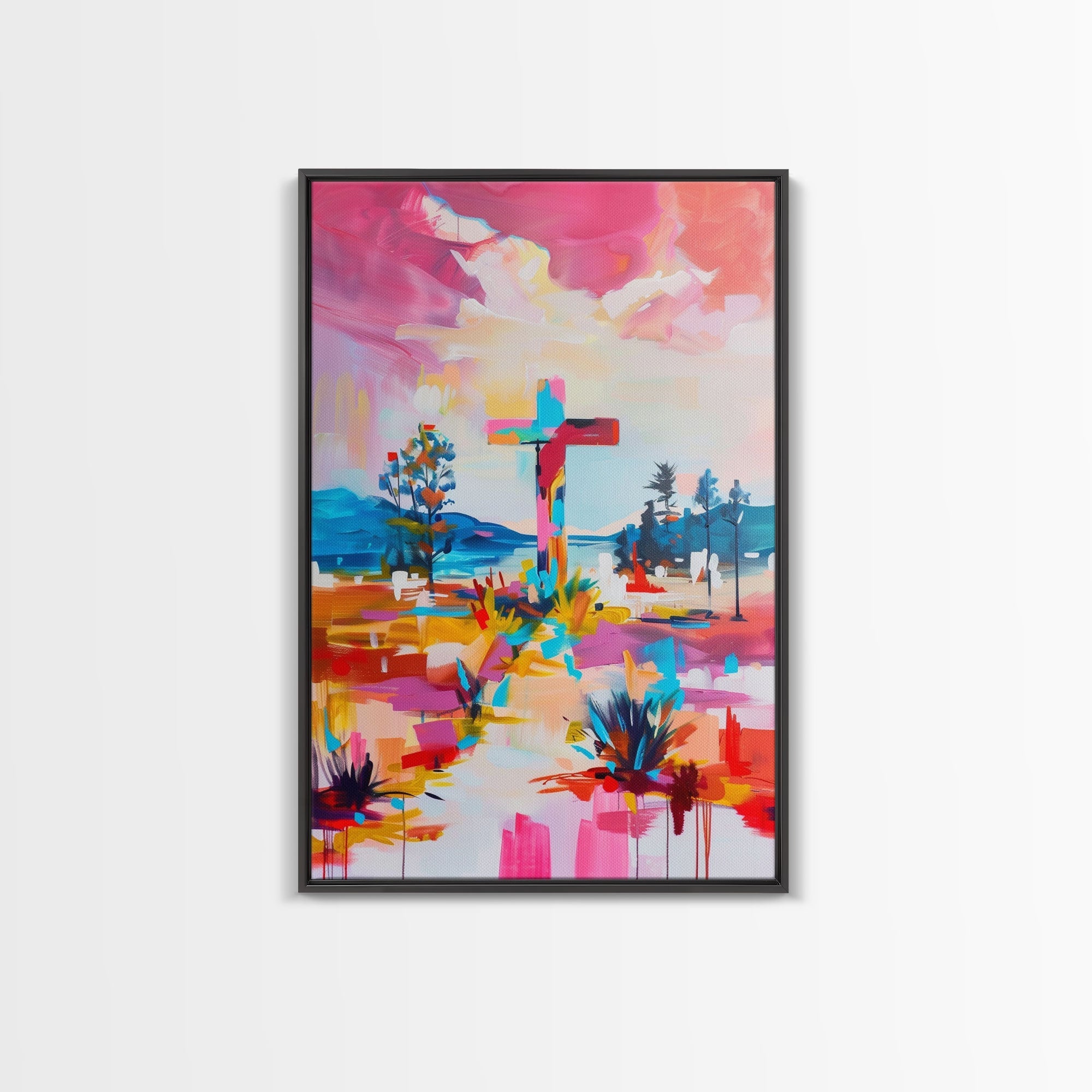 Black-framed canvas wall art with colorful cross and western landscape, bright abstract