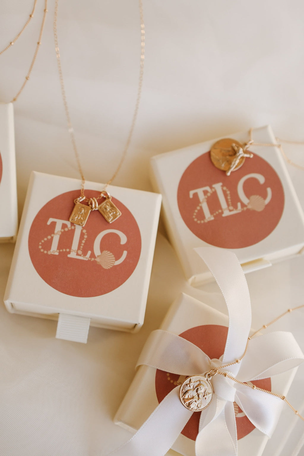 St. Therese of Lisieux crucifix necklace with gold-tone charm in gift boxes and white ribbon