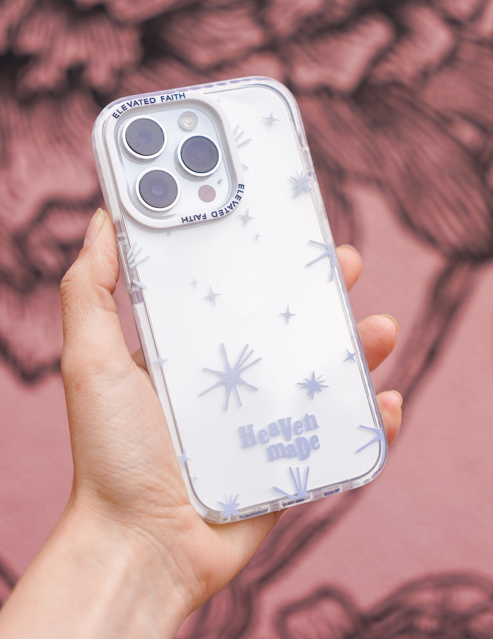 Heaven Made phone case, clear white starburst pattern with camera cutouts