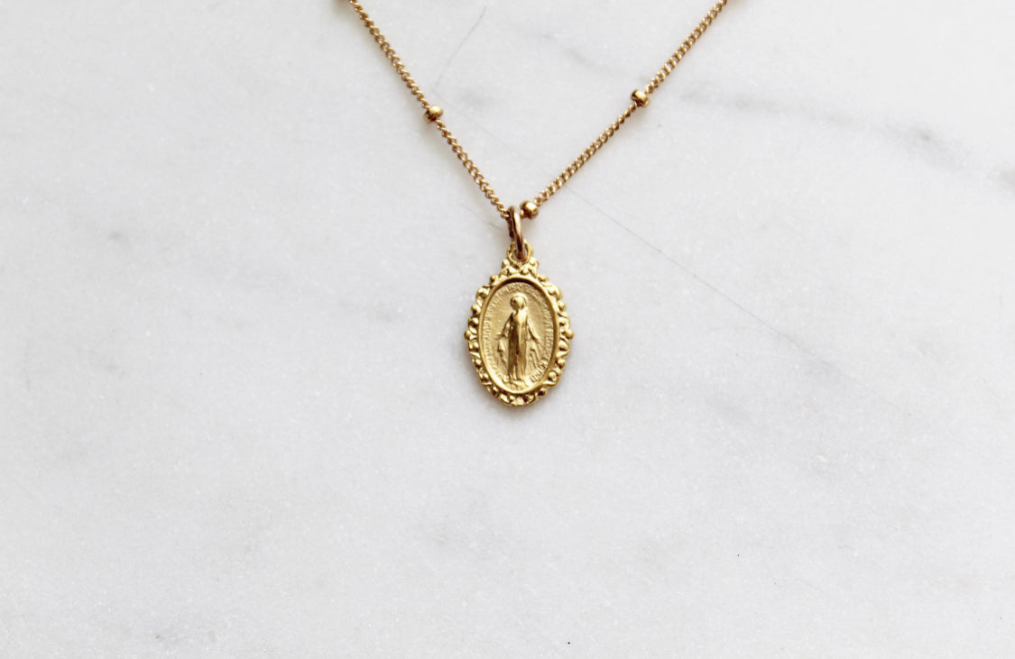 Gold-tone chain necklace with single oval Miraculous medal pendant