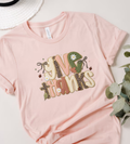 Blush pink crewneck T-shirt with 'Give Thanks' patch-style graphic