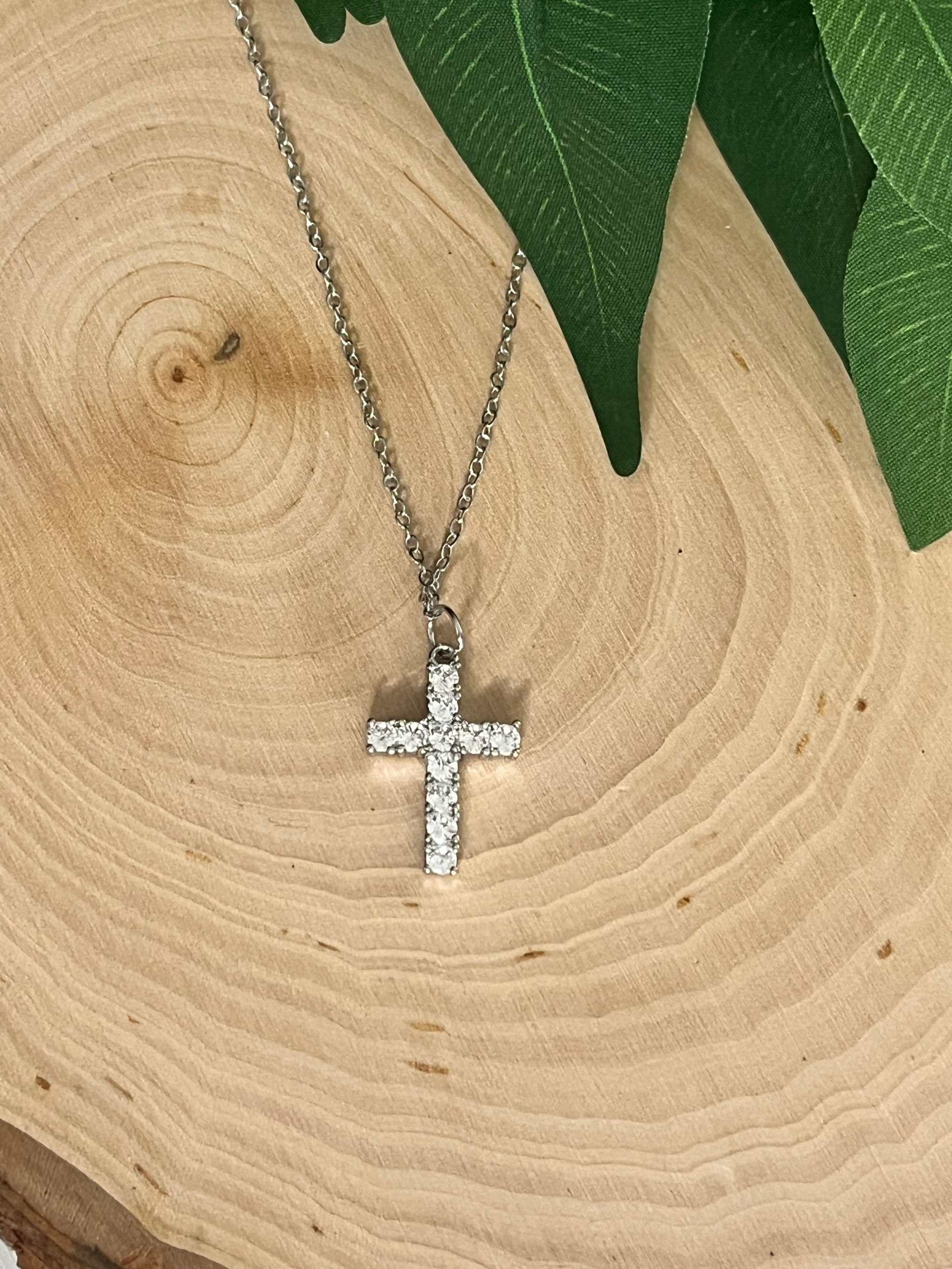 Silver cross pendant necklace with crystal accents