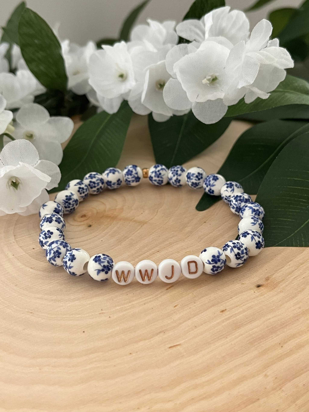 Blue and white floral bead bracelet with WWJD letter beads