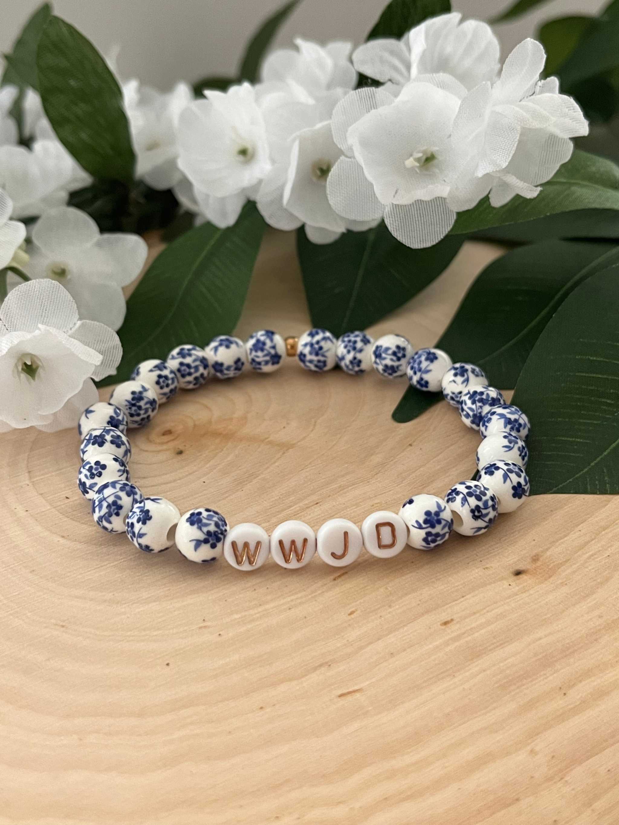 Blue and white floral bead bracelet with WWJD letter beads