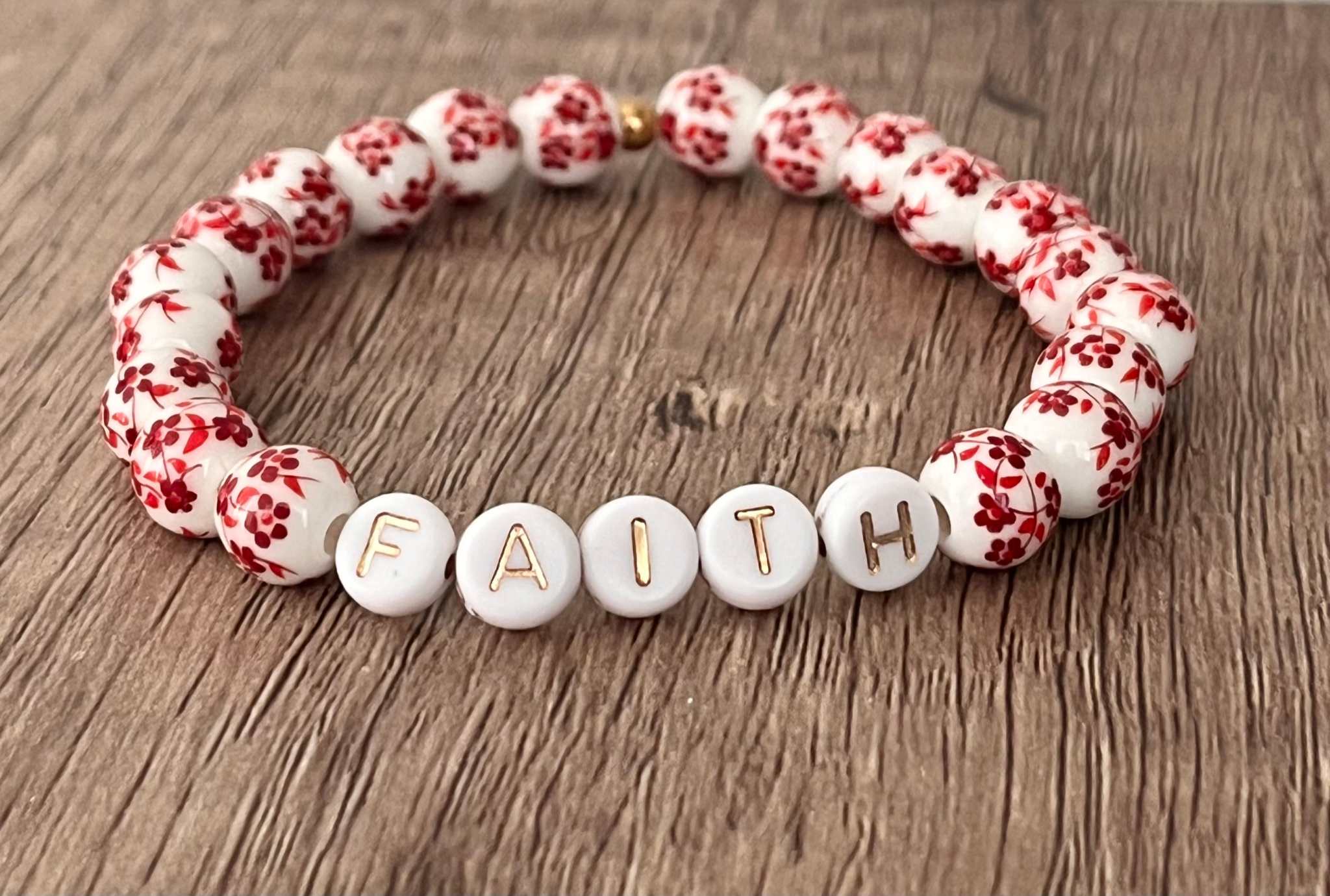 Floral bead bracelet with ceramic letter beads spelling FAITH