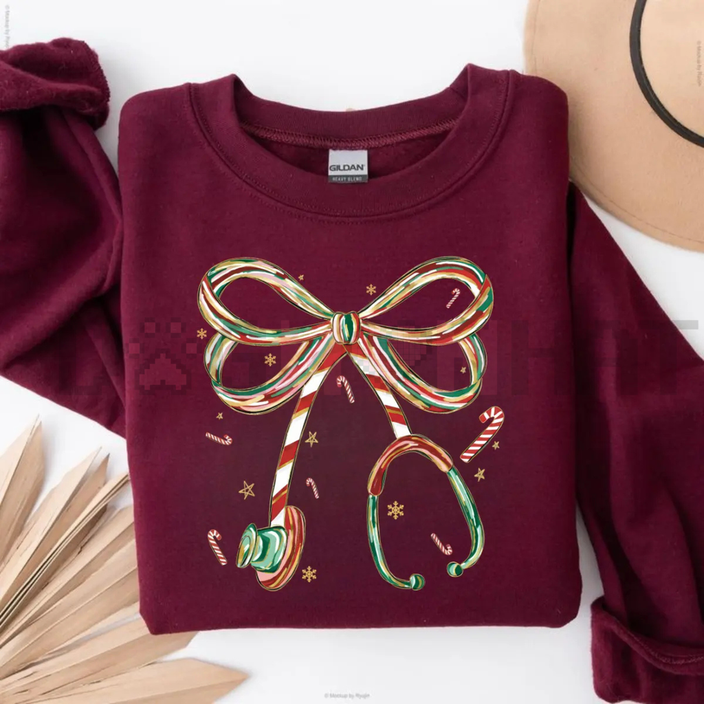 Maroon Christmas nurse sweatshirt with colorful bow and candy cane graphic on front