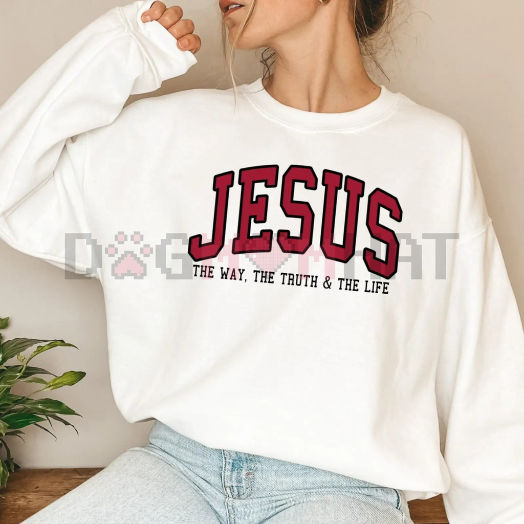 White crewneck sweatshirt with red Jesus logo and faith slogan on front