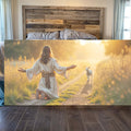 Landscape wall art canvas showing kneeling woman in white robe, arms out, with lamb