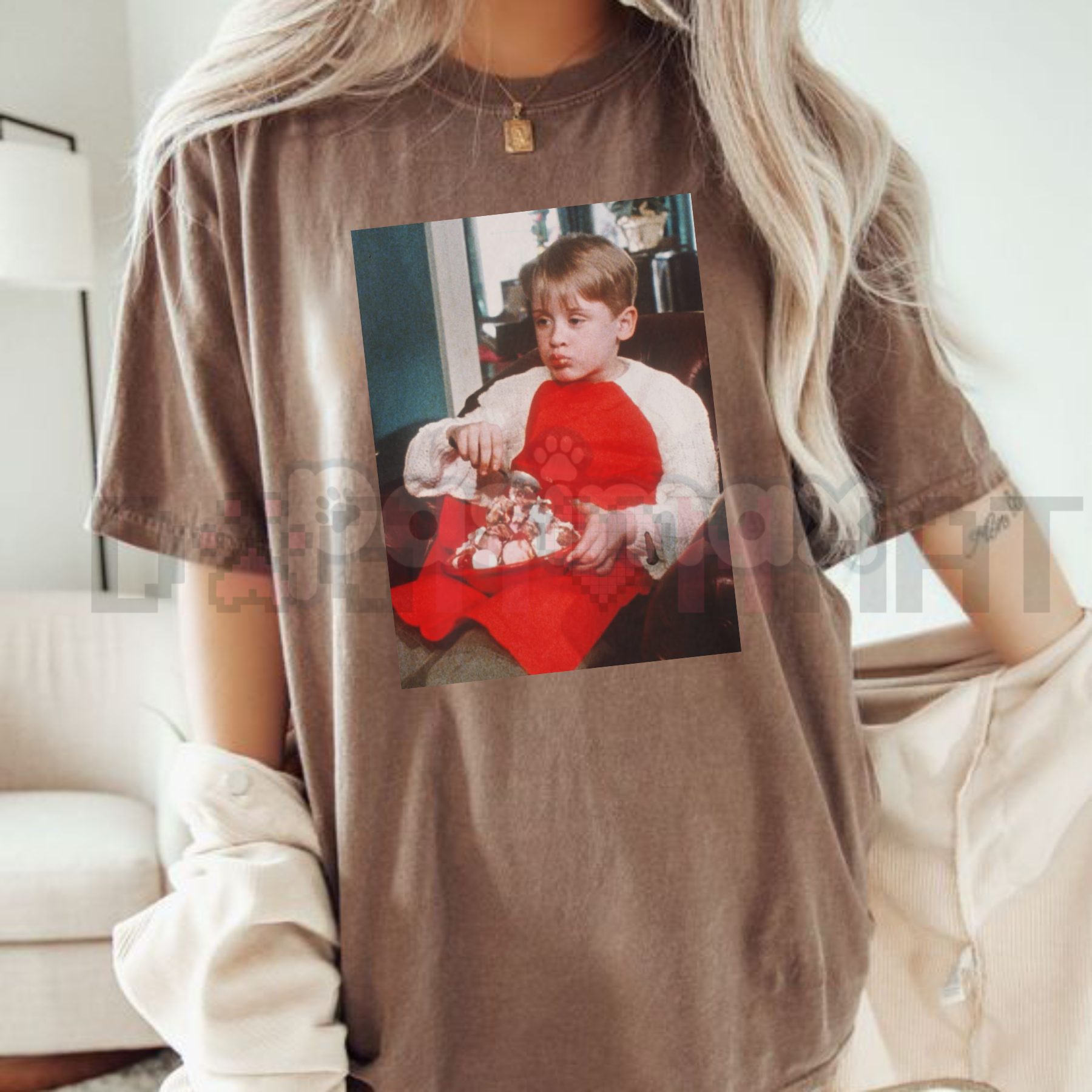 Brown Christmas t-shirt with front photo graphic of a boy holding toys