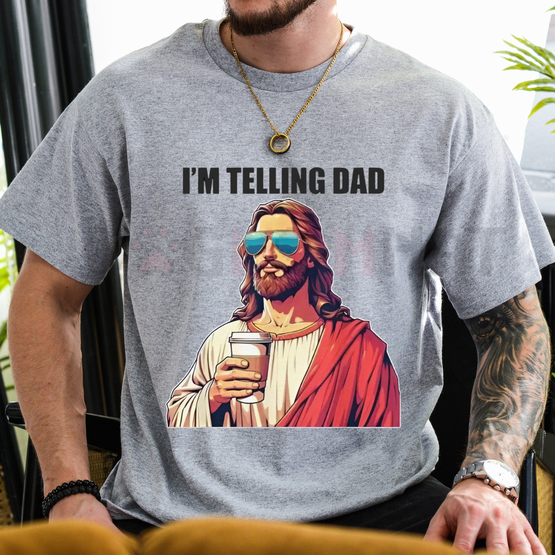 Heather gray T-shirt with "I'M TELLING DAD" text and Jesus-style graphic in red