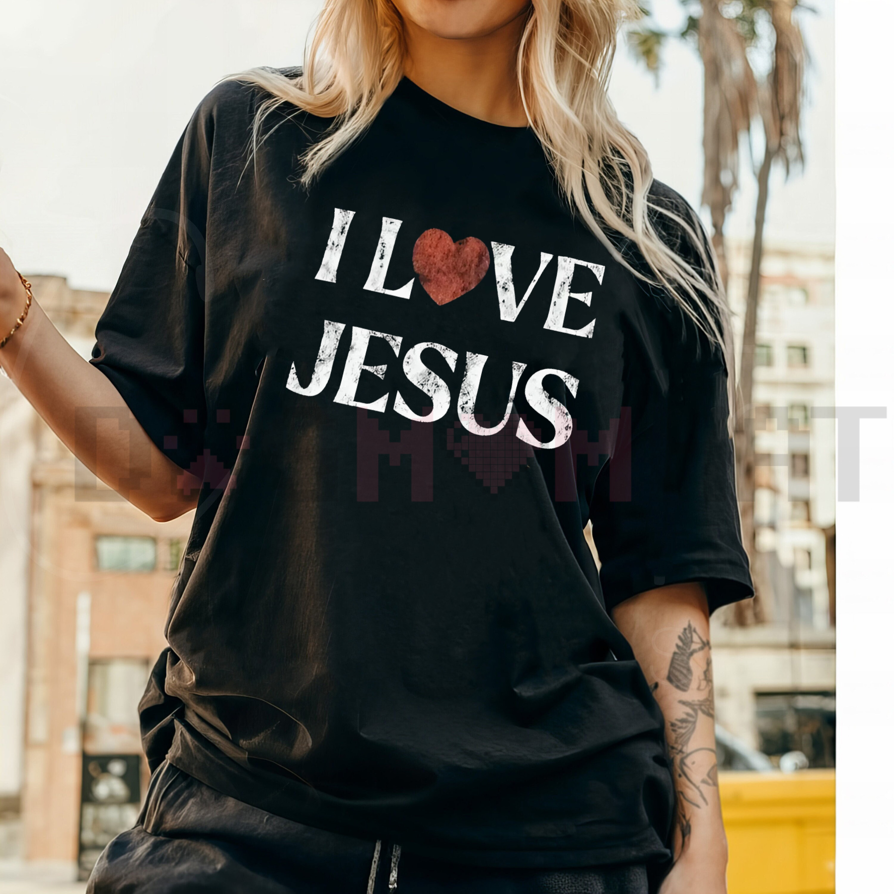 Black T-shirt with large 'I LOVE JESUS' white print and red heart