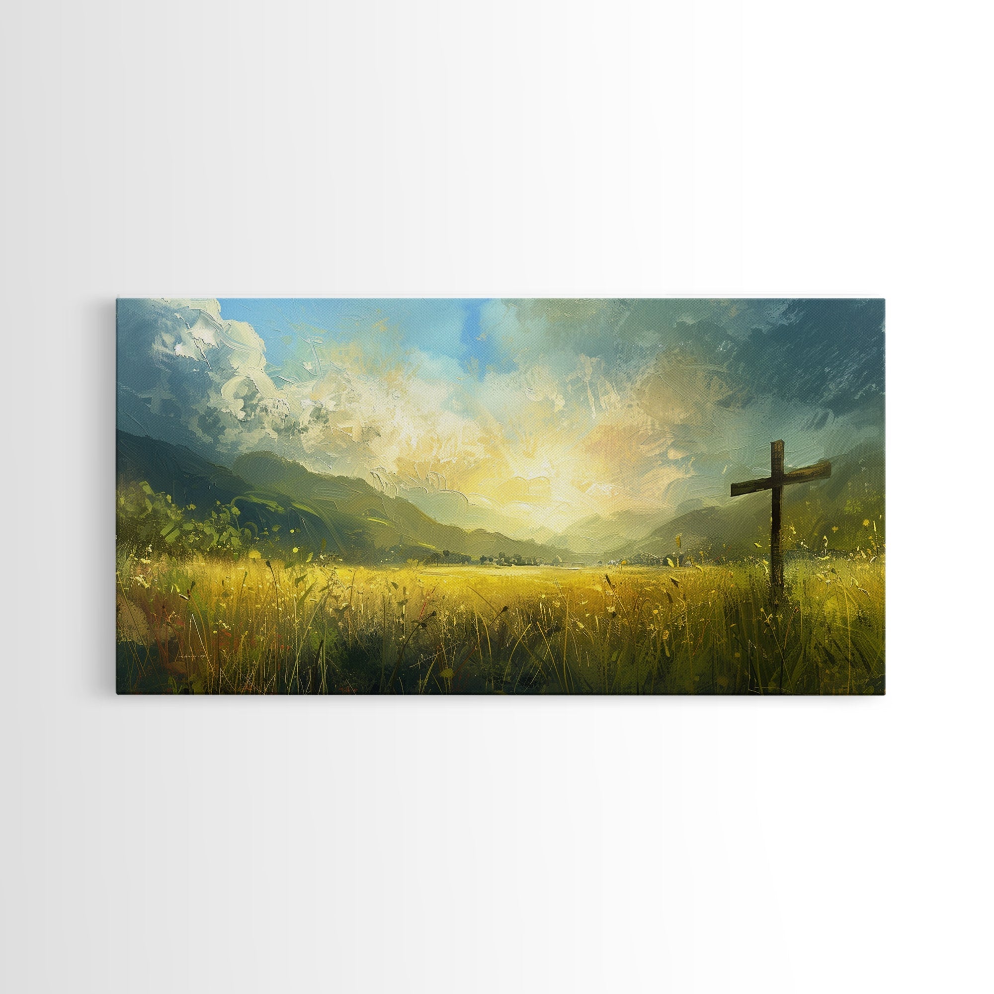 Framed canvas print of a cross in a yellow-green field under a glowing sky